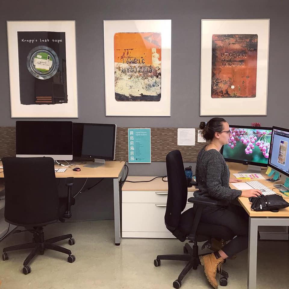 A photo of the lab with three of Briar Craig's prints displayed in frames